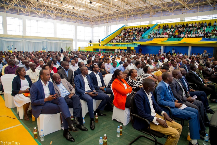 Participants at the general assembly of the City of Kigali follow the proceedings at Petit Stade in Remera. (Faustin Niyigena.)