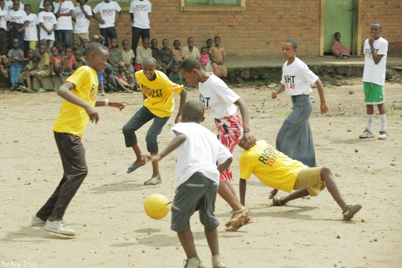 Kids play football at Kanembwe School in Rubavu District. (Net photo)