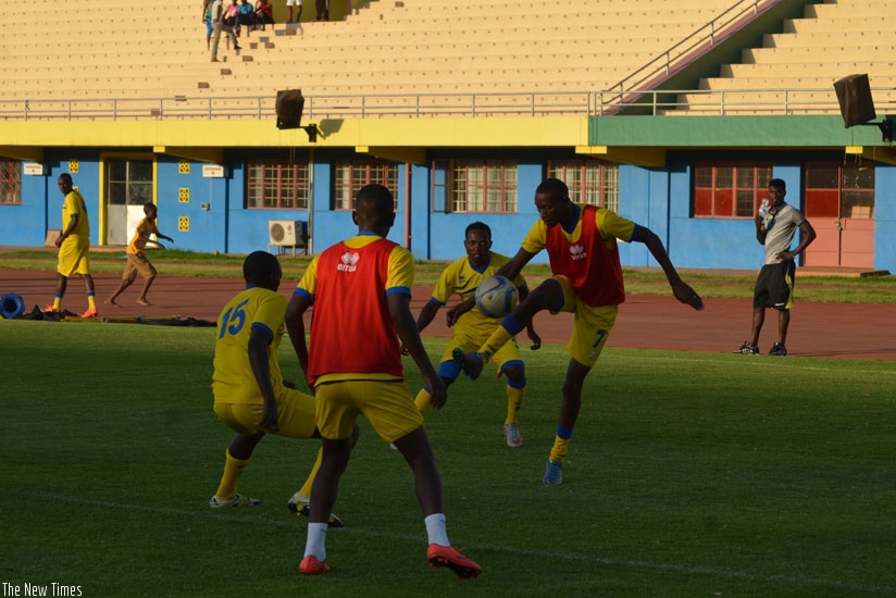 Midfielder Jean Baptiste Mugiraneza controls the ball during Amavubiu2019s training session on Monday at Amahoro National Stadium as the team stepped up preparations for the AFCON 20....