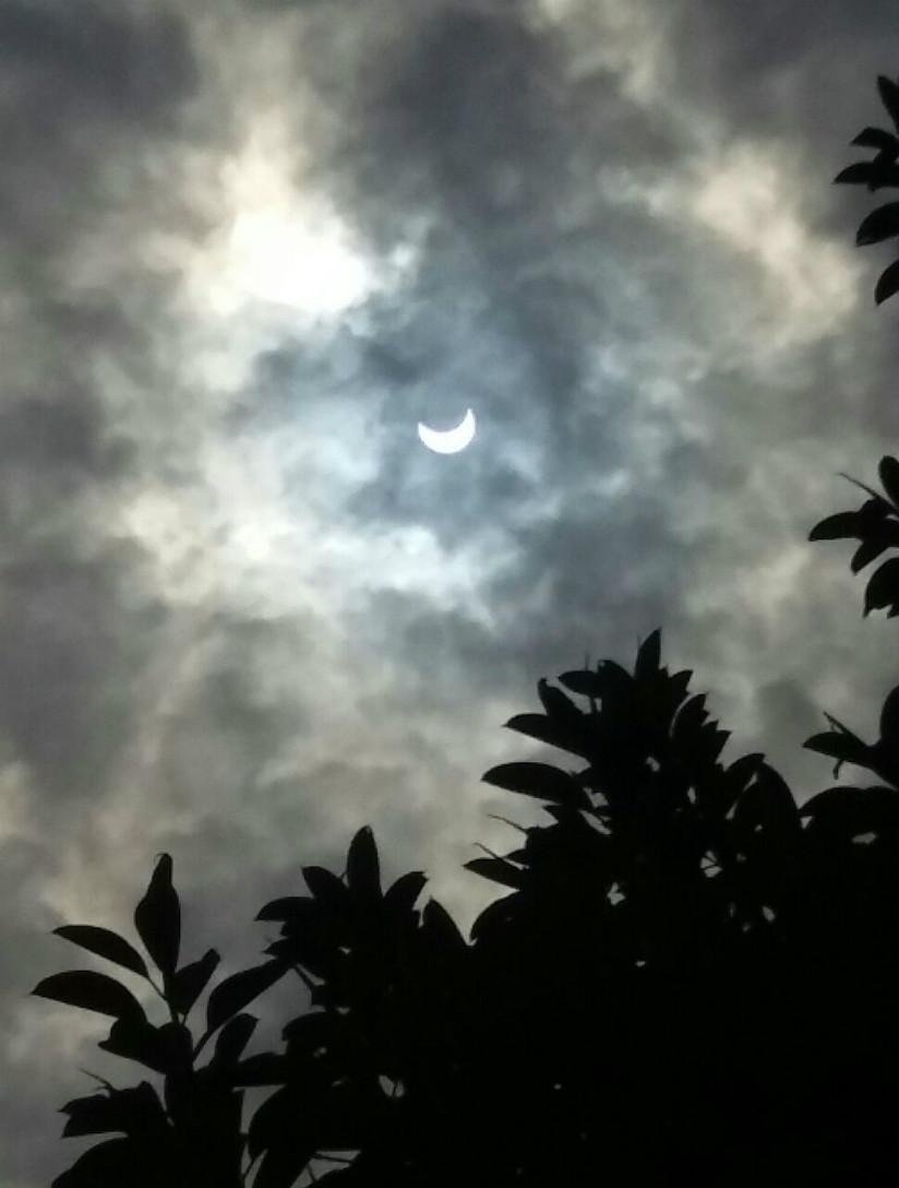 People in Kigali can currently view the unfolding partial solar eclipse, that's expected to last hours. / Courtesy