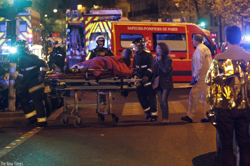 Medics move a wounded man near the Boulevard des Filles-du-Calvaire after an attack in Paris last year. (Net photo)