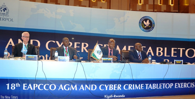 L-R: The SG of Interpol Dr Jurgen Stock, IGP of Kenya Joseph K. Boinnet, Minister Harerimana and Rwanda National Police IGP Emmanuel Gasana at the official closing of the 18th EAPC....