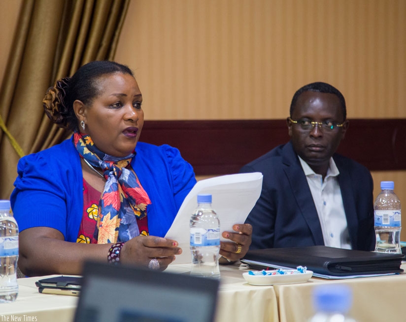 MP Nyirahabineza opens the discussion in Kigali yesterday as Ngoga looks on. (Photos by Faustin Niyigena)