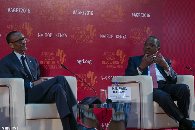 President Kagame and his Kenyan counterpart Uhuru Kenyatta on a panel discussion during the African Green Revolution Forum  in Nairobi, Kenya, yesterday. (Village Urugwiro)