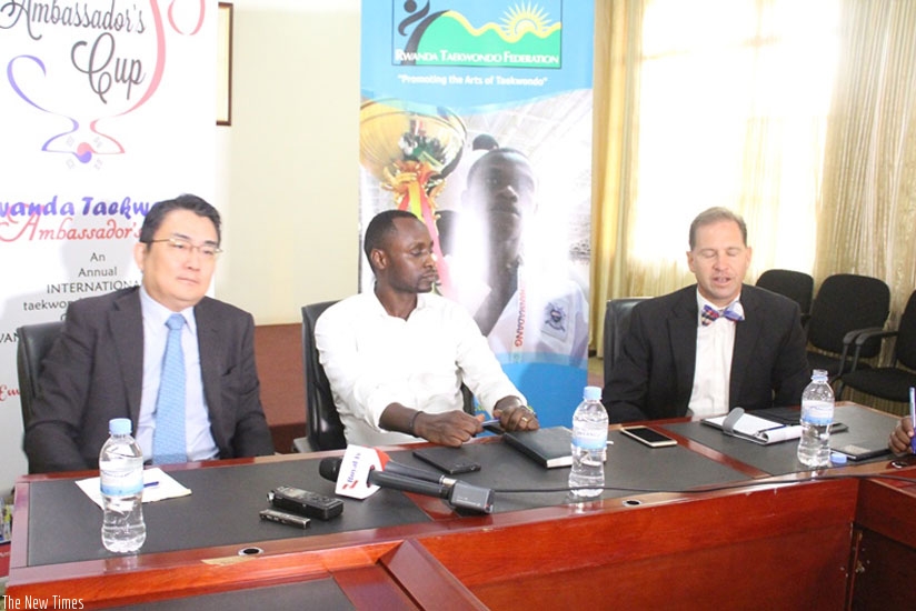 L-R: Amb Park Yong-Min, Bagabo  and technical director Martin Koonce at the press conference on Wednesday. (J. Asiimwe)
