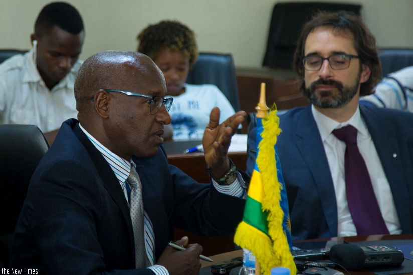 Ntaganda Semafara, head of Rwanda Meteorology Agency, (L) speaks to the media as Vincent Gabaglio International Relations Officer, EUMETSAT, looks on. (T.Kisambira)