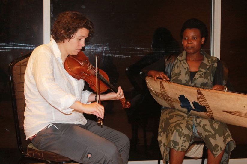 Sofia Nzayisenga collaborates with a visiting musician during the Ubumuntu Arts Festival in Kigali in July. / Moses Opobo.