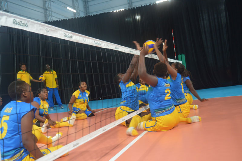 The national sitting volleyball team trains before their match against China which they lost 3-0. Rwanda plays Iran in their second group match tomorrow. / Pascal Bakomere
