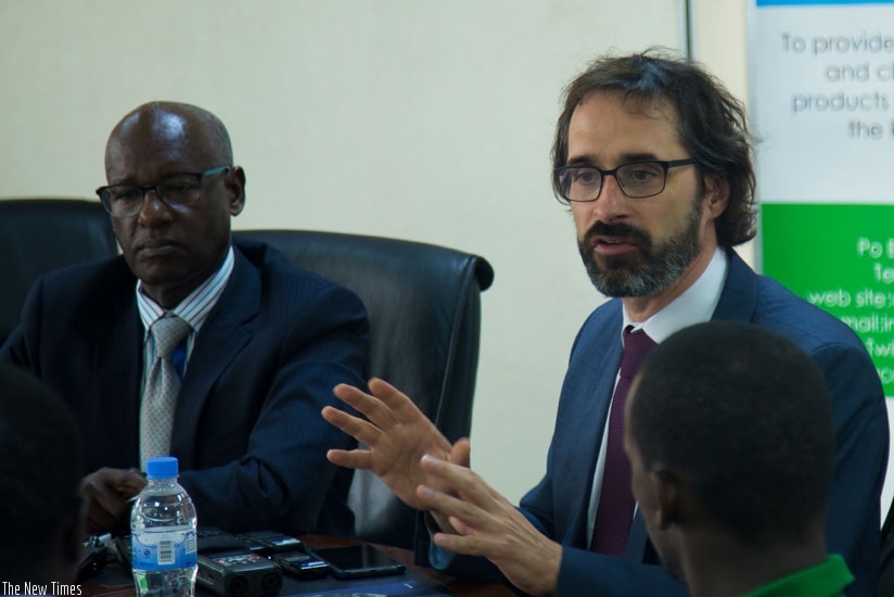 Gabaglio addresses journalists as Ntaganda (L) looks on last week. (Timothy Kisambira)