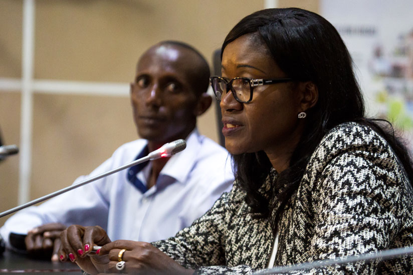 Kigali City Mayor Monique Mukaruliza and deputy president of Advertisers Association, Charles Tusubira in a press conference yesterday. (Faustin Niyigena)