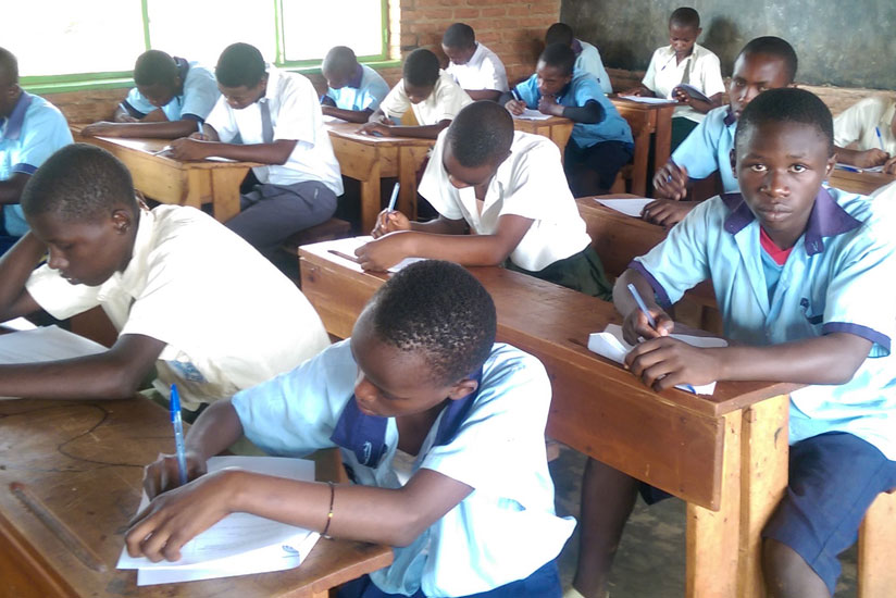 Students sit an examination. Completion rates among students require innovative ways to keep them motivated in studies. / Solomon Asaba