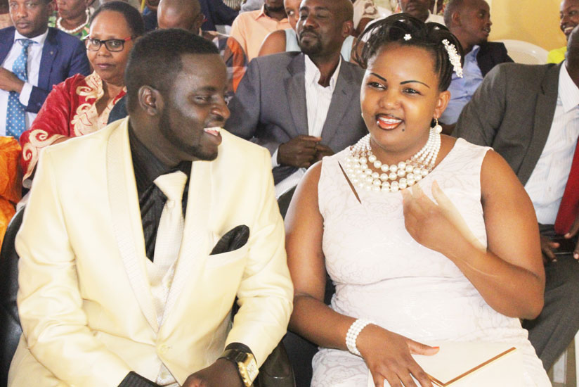 Nkurunziza and Umuhoza share a light moment during the civil marriage ceremony. (Courtesy photos)