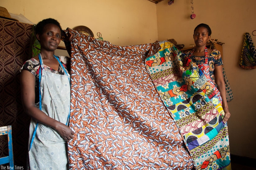Women entrepreneurs display duvets they made using African print (Kitenge) at Cocoki Design Sewing. (Faustin Niyigena)