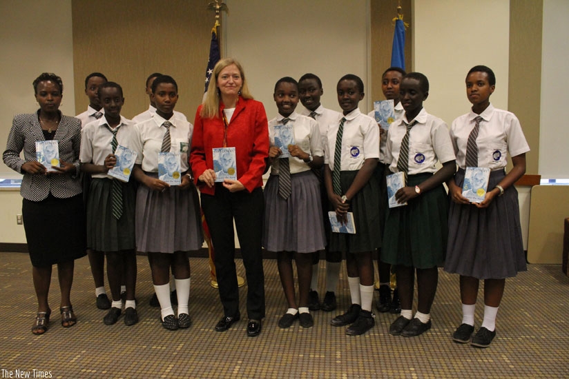 Amb. Barks-Ruggles poses with students at the launch of Everybody Reads Rwanda campaign.  / Courtesy.