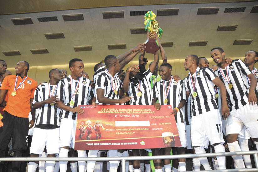 APR FC players celebrate after beating AS Vita Club in the final to win the AS Kigali Pre-season Tournament on Saturday at Amahoro National Stadium. / Sam Ngendahimana