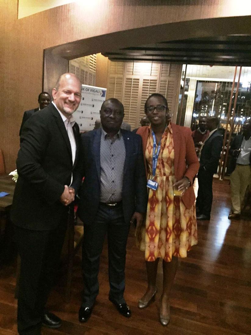 Marriott's Kenneth Shore and BK's Diane Karusisi with the customer (center) that won a night at the Marriott hotel. / Courtesy