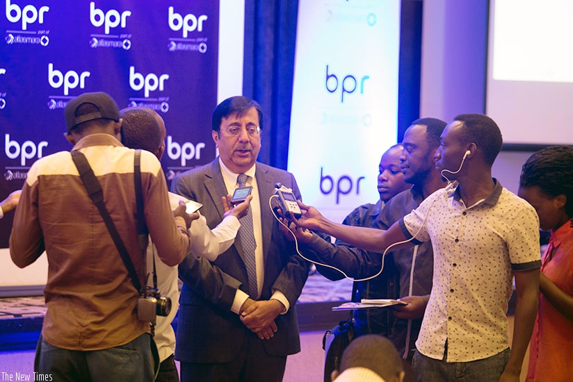 Sanjeev Anand the CEO of BPR Bank speaks to the media after the meeting last week. / Timothy Kisambira.