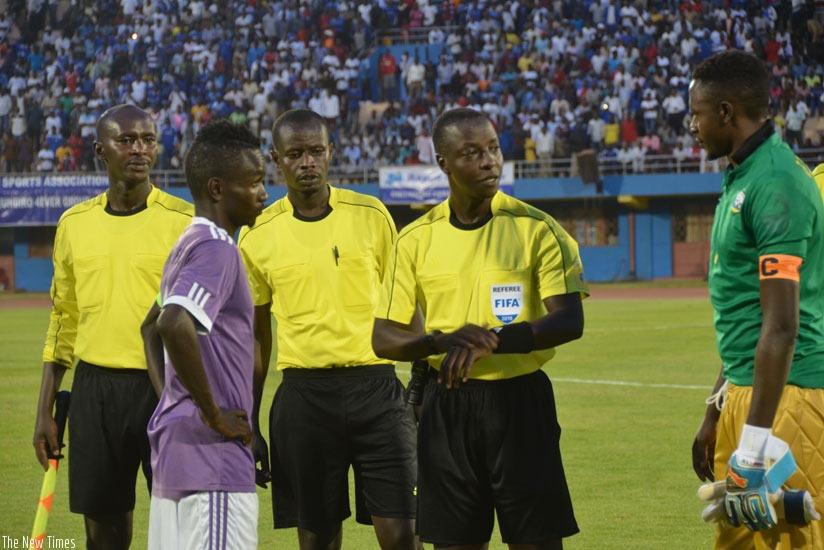 Munyemana (C) before officiating the pre-season match between Rayon Sports and Sunrise FC. Rwandau2019s top ref has announced his retirment at the age of 42. (Nadege Imbabazi)