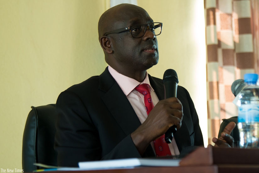 Busingye addresses journalists on the new laws in Kigali on Tuesday. (Timothy Kisambira)