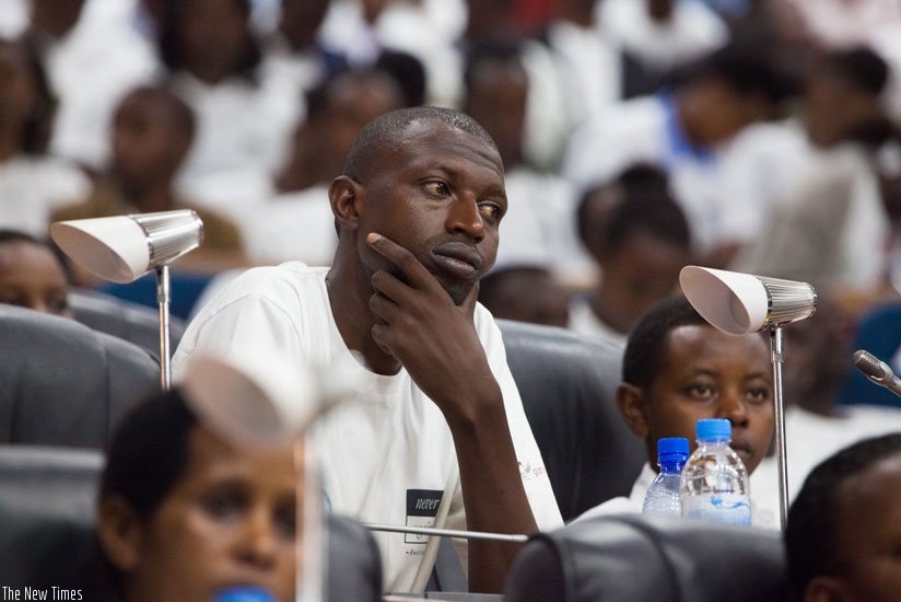 A participant follow proceedings at Parliament yesterday. (Nadege Imbabazi)