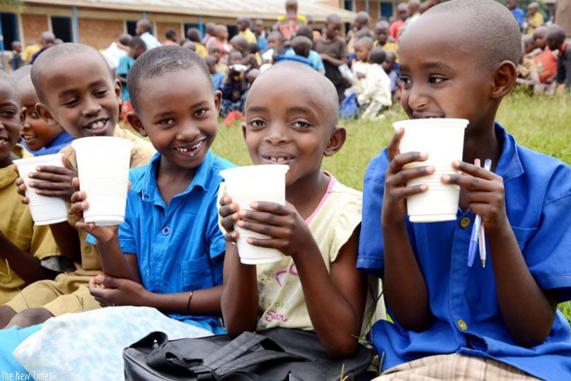 Children take milk during a past malnutrition campaign. (File)