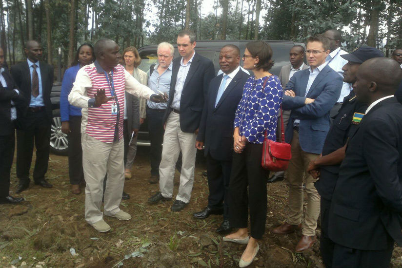 Minister Wharton (in black jacket), Northern Province Governor, Aime Bosenibamwe, DFID Country Head Laure Bonfils, and UK High Commissioner to Rwanda William Gelling, among other o....