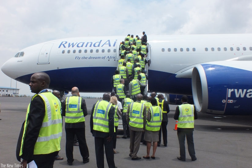 RwandAir staff and other public officials board Ubumwe for a tour yesterday. / Peterson Tumwebaze