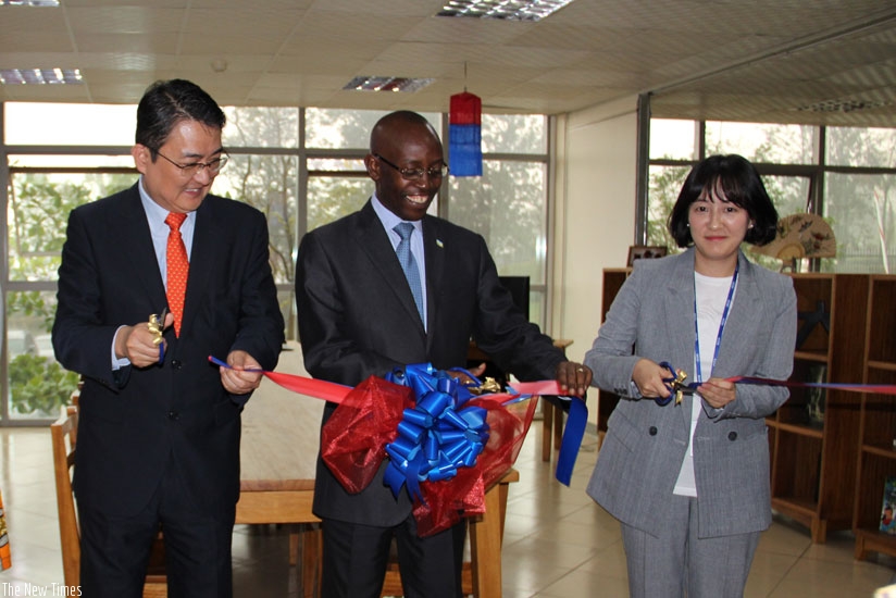 L-R: Amb.Park Yong-min, Dr Ntivuguruzwa and Choi je yun, Deputy country director of KOICA during the launch of the Korea Corner at the Kigali Public Library in Kacyiru on Tuesday. ....