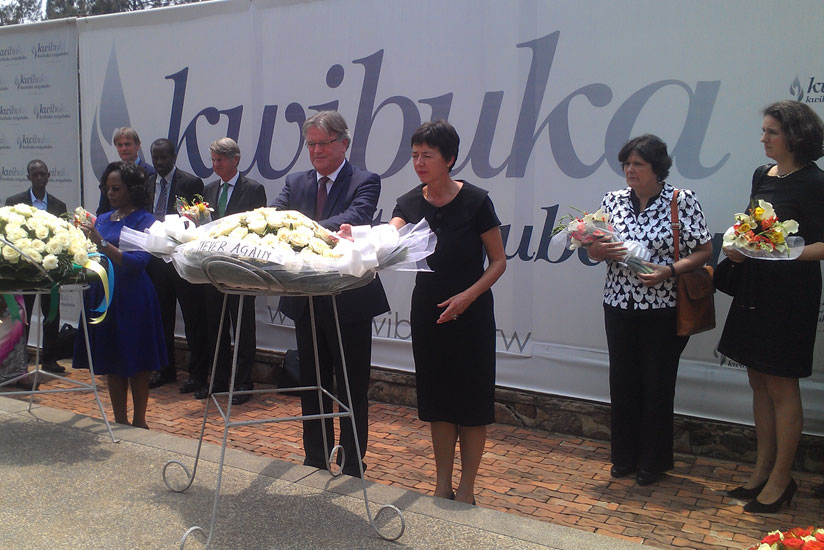 Riedstra (C), Amb. Maria de Man (R) and Kalihangabo (L) lay wreaths in honour of Genocide victims at Kigali Genocide Memorial Centre yesterday. / Frederic Byumvuhore.