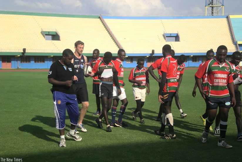 Scottish 7s captain Scott Wight (with ball) after a training session with rugby players and coaches on Suday at Amahoro National Stadium. (S.  Kalimba)