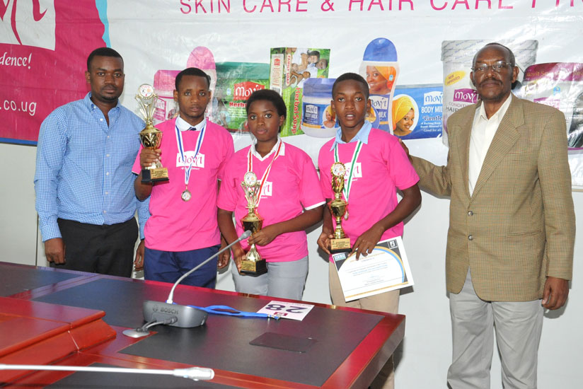 Winners of the Kinyarwanda competition pose with their trophies.  / Sharon Kantengwa