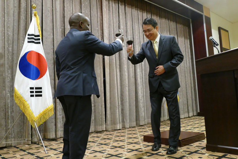 Amb. Park shares a toast with Nsengimana at the event to mark Korean Foundation Day in Kigali on Monday. / Courtesy. 