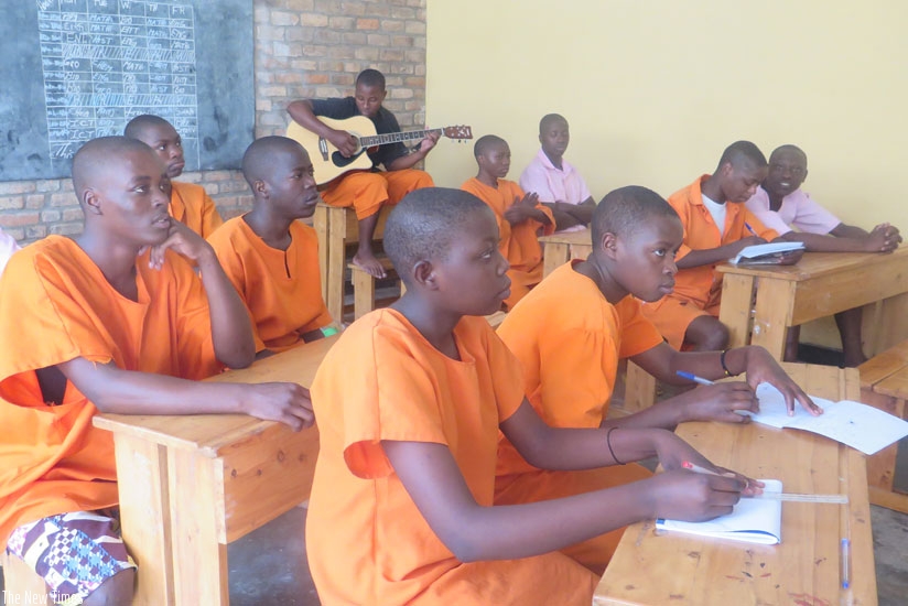 Juveniles attend a music lesson at the Nyagatare Rehabilitaion Centre. / Frederic Byumvuhore