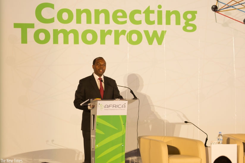Gatare gives his opening remarks at the conference in Kigali yesterday. (Timothy Kisambira)