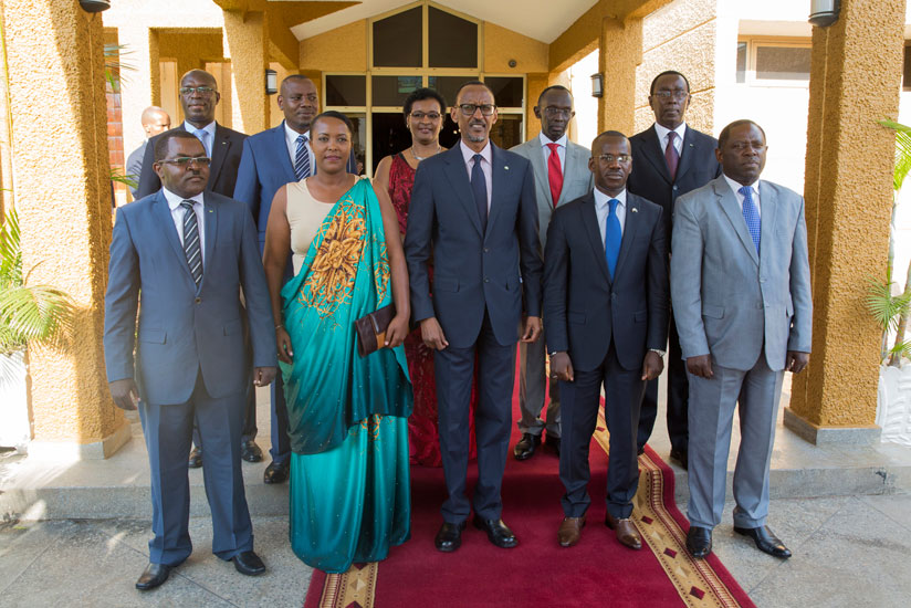 President Kagame in a group photo with newly-sworn in members of the Cabinet and other top officials, including Prime Minister Anastase Murekezi (behind left), Speaker Donatille Mu....