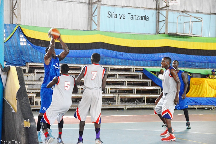 Espoir centre player Bievenue Ngandu takes a shot during their fifth-place playoff game  against UCU on Friday. / Geoffrey Asiimwe.