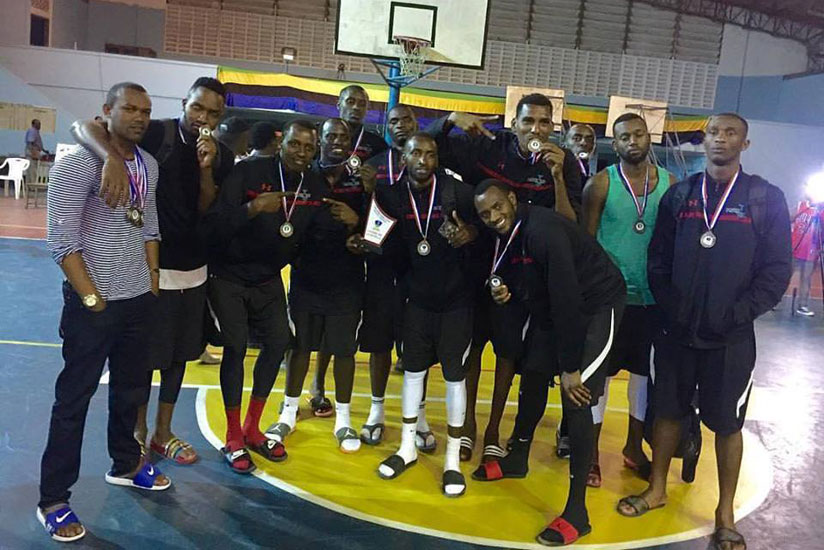Ubumwe shooting guard Ines Nezerwa impressed but the team could only manage third-place finish while Patriots players pose with their bronze medals after defeating USIU of Kenya in....