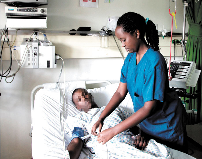 A nurse attends to a patient. A new organisation that brings together physicians in Kigali has been formed to voluntarily offer palliative care to patients.  / File