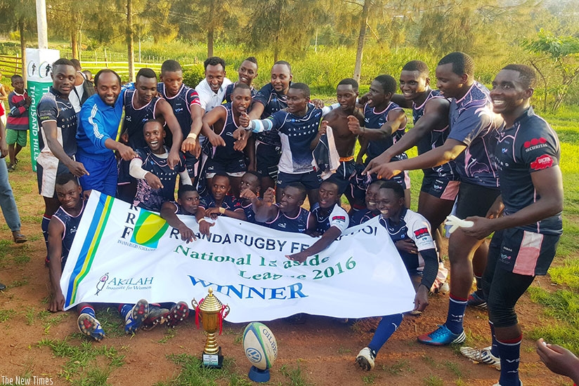 Thousand Hills RFC celebrate in a group photo after defeating Resilience to win the national championship. / A. Nadia Tasha