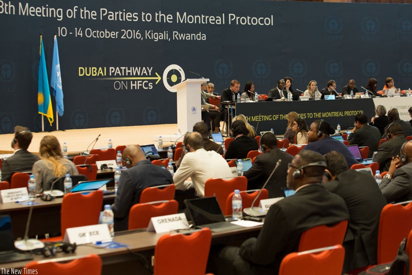 Participans follow proceedings during the Montreal Protocol meet yesterday. (T. Kisambira.)