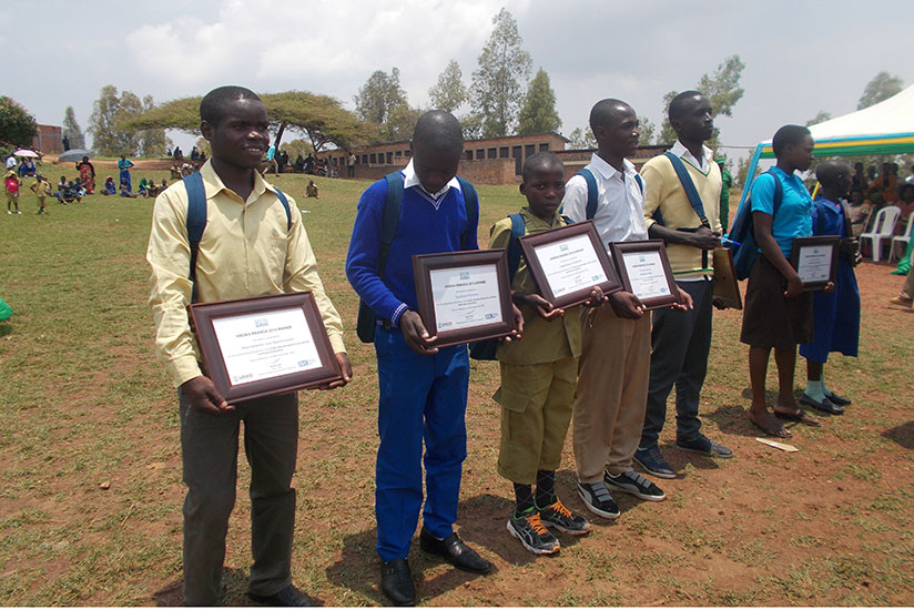 Some of the winners pose with certificates.