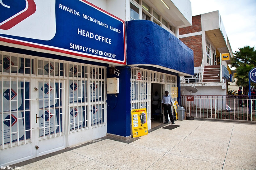 A private security guard at Rwanda Microfinance Ltd head office in Kigali. / File