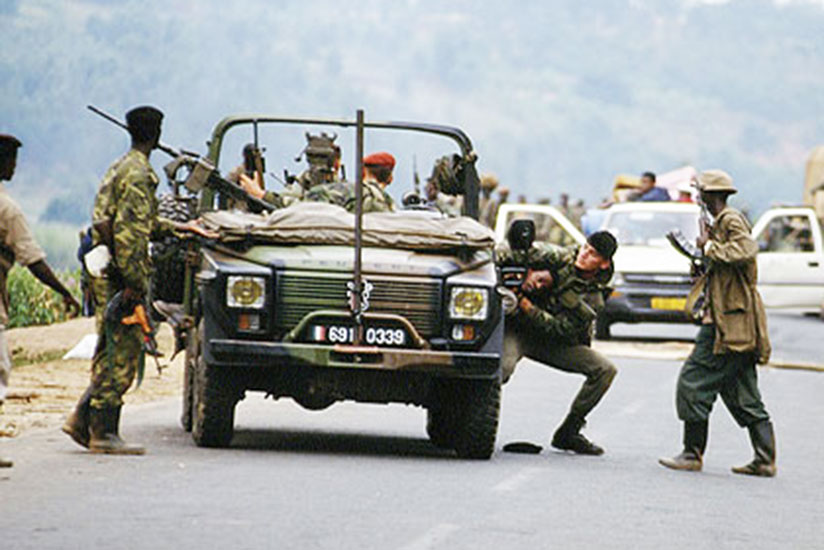 French soldiers hand over an unwilling Genocide victim to militiamen at a road block during the 1994 Genocide against the Tutsi. / File.