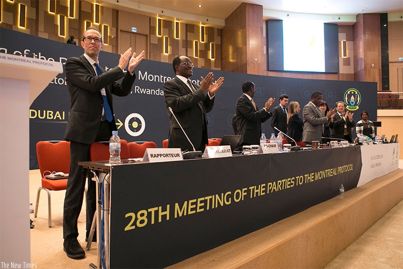 Delegates applaud the signing of the Kigali Amendment at the 28th Meeting of Parties to the Montreal  Protocol at Kigali Convention Centre on Saturday. Rwanda has set January 2017 ....