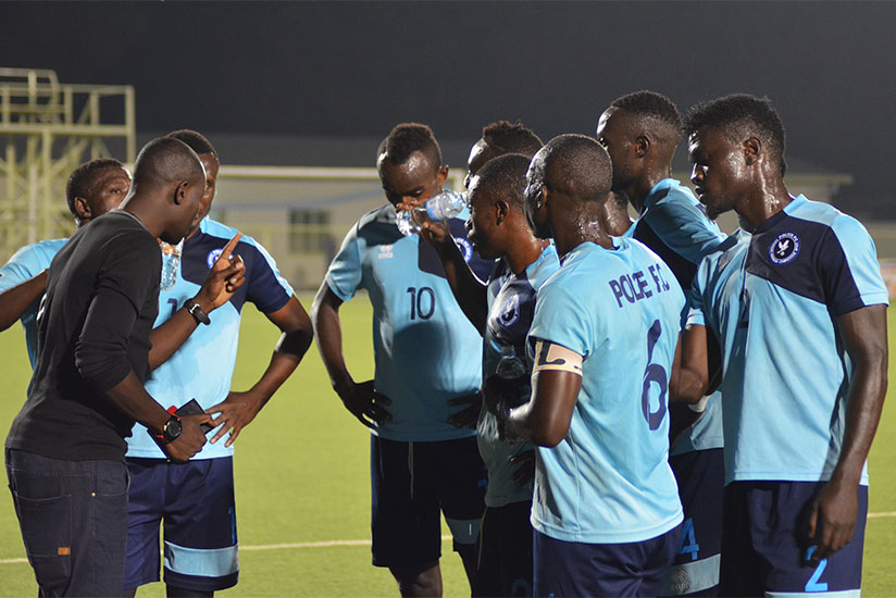 Police players listen to instructions from coach Seninga during the Rayon Sports game last week. Police will be keen to return to winning ways when they take on Bugesera on Saturda....