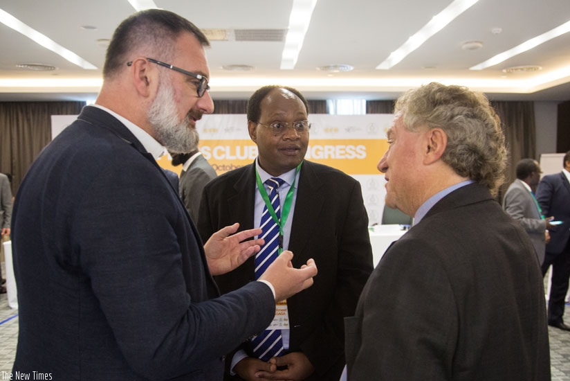 The Head of European Union Delegation to Rwanda, Amb. Michael Ryan (R), chats with Sagaga (C) and Wlodarczyk on the sidelines of ACP congress yesterday. (F. Niyigena.)