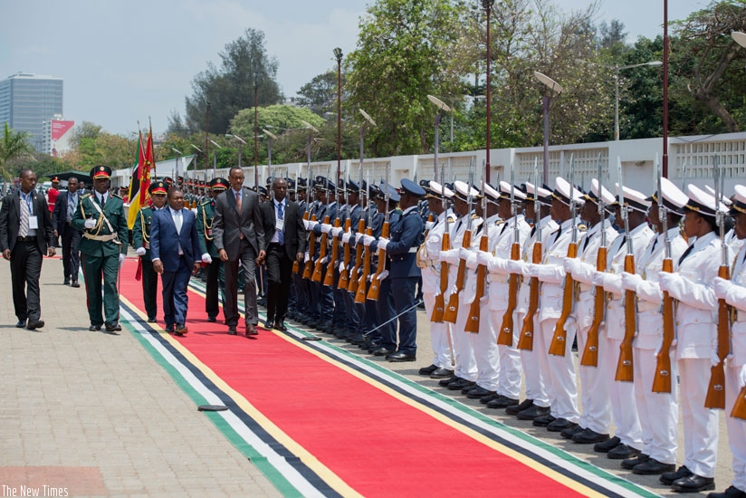 President Kagame and his host, President Filipe Nyusi of Mozambique, inspect a guard of honour in Maputo yesterday. The two Heads of State held bilateral talks prior to the signing....