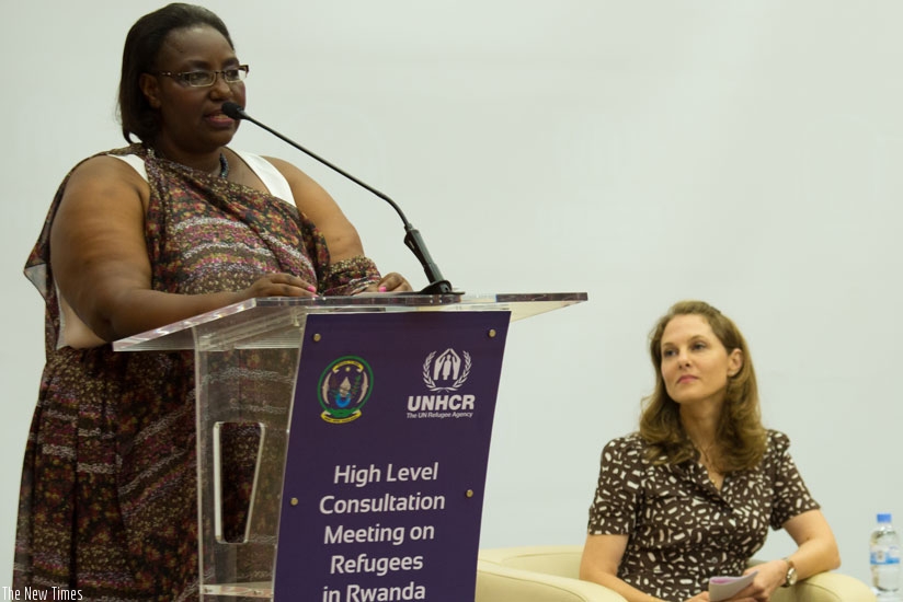 Disaster Management and Refugee Affairs minister Saraphine Mukantabana (L) speaks during the meeting as Princess Sarah Zeid of Jordan looks on. (Photos by Timothy Kisambira)