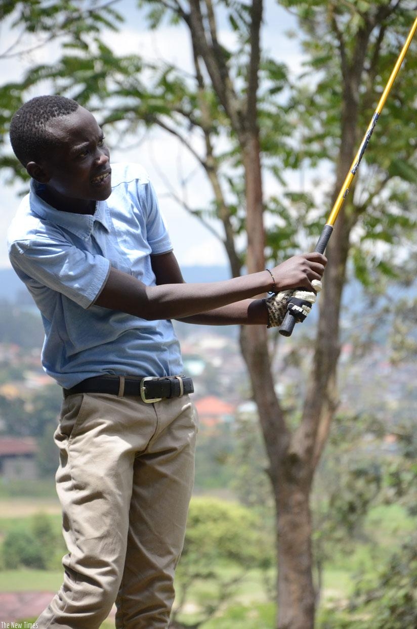 Celestin Nsanzuwera, 15, the youngest on the eight-man team, is making his EA Golf Challenge debut. (Sam Ngendahimana)
