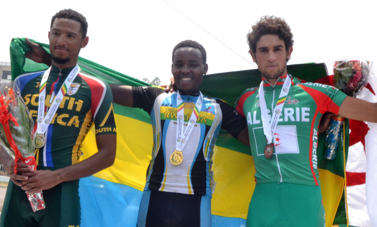 Retired cyclist, Janvier Hadi (C), secured Rwanda's first gold with a victory in the men's road race at the 2015 All Africa Games in Brazzaville. / File